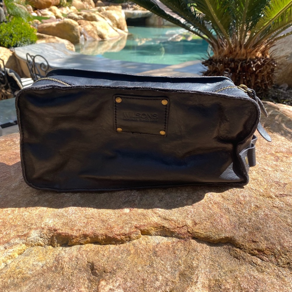 Subtle soft WILSONS leather black and brass luxury toiletry men’s bag